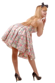 beautiful pinup girl with a colorful dress isolated on white background