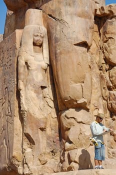 Amenhotep III' s wife at Colossi of Memnon in Luxor, Egypt. Photo taken on Feb 26, 2007.