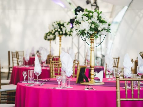 Beautiful dinner wedding table setting, summer outdoor