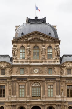 The Louvre across the Seine River in Paris France