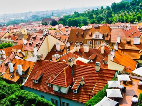 View from above to tiled roofs of old town, panorama of Prague, Czech republic