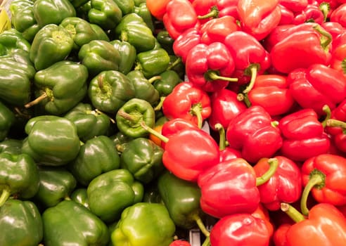many red and green pepper ready to sale on the big market
