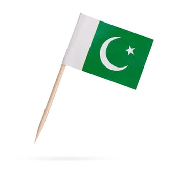 Miniature paper flag Pakistan. Isolated Mini Pakistani flag pointer on white background. With shadow below