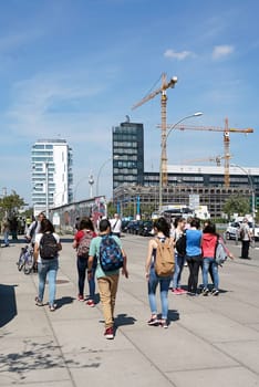 Tourists at the East-Side Gallery in Berlin