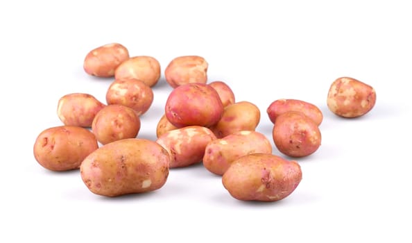 Fresh potatoes on white background.