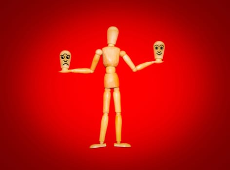 The wooden figure and various human emotions on red