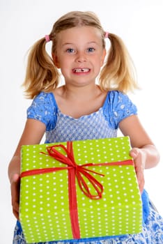 blond girl with green gift box in front of white background