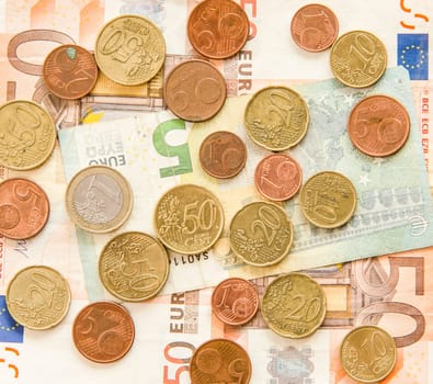 lose up of euro currency. coins and banknotes. money background