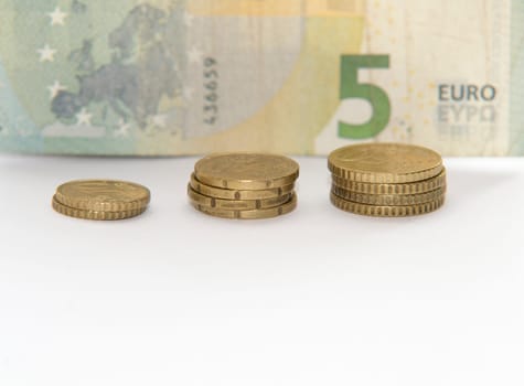 close up of euro currency. coins,banknotes and calculator