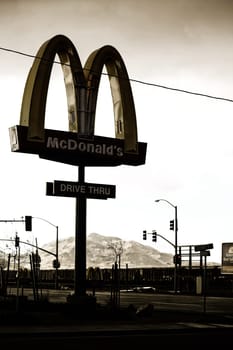 Mojave,United States - December 22,2015: An MC Donalds fast food restaurant on the main thoroughfare and next to the train tracks on December 22,2015 in Mojave.