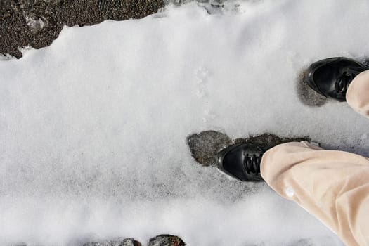 Risk of slipping on snow-slick road