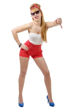 Pretty girl pin-up in shorts with the thumb down. Beauty, fashion