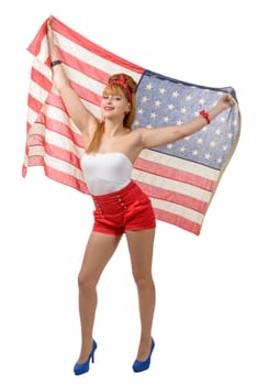 a sexy pin up girl  holding an American flag on white background
