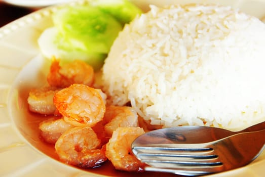 Thai food. rice and shrimp with sweet and spicy sauce