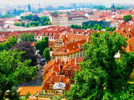 View from above to tiled roofs of old town, panorama of Prague, Czech republic