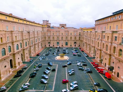 Vatican, Italy - May 02, 2014: Vatican Museums, one of the courtyards with cars. View from the window of the museum
