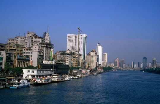 the city of Canton or Guangzhou in the north of Hongkong in the province of Guangdong in china in east asia.