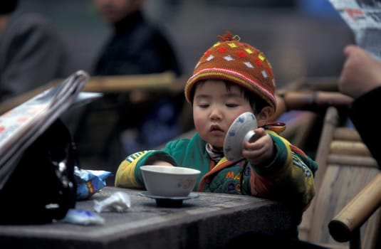 Chinese People siting in Tea House in the city of Chengdu in the provinz Sichuan in centrall China.