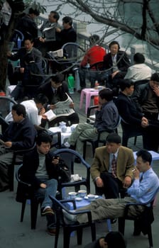 Chinese People siting in Tea House in the city of Chengdu in the provinz Sichuan in centrall China.