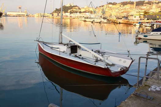 Motor Italian boat on the offshore berth Italy