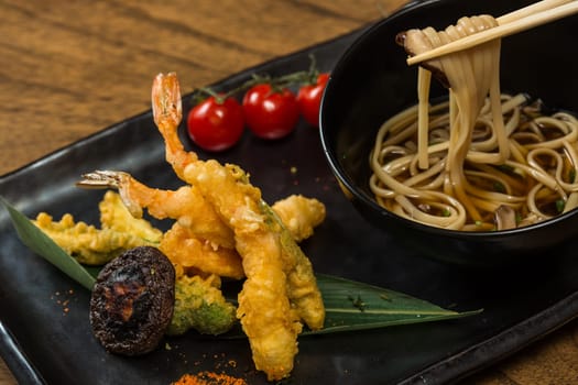 Japanese Cuisine. Tempura Shrimps with Vegetables. Shallow dof.