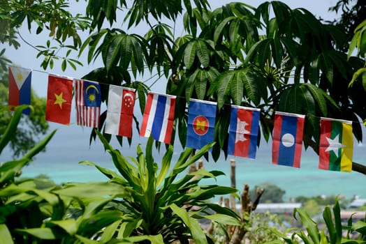 Flags of the ASEAN Nations in the Town of Ko PhiPhi on Ko Phi Phi Island outside of the City of Krabi on the Andaman Sea in the south of Thailand.
