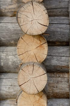 Detailed view of a wooden house in block plank construction