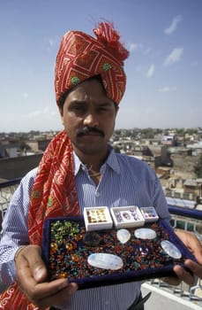 stone finsher at work in the city of Jaipur in the province of Rajastham in India.