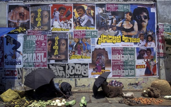 a wall with promotion of Bollywood production in the city of Madras in India.