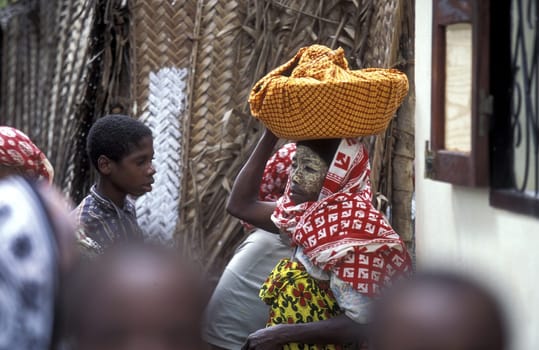 Women at the Market in the city of Moutsamudu on the Island of Anjouan on the Comoros Ilands in the Indian Ocean in Africa.