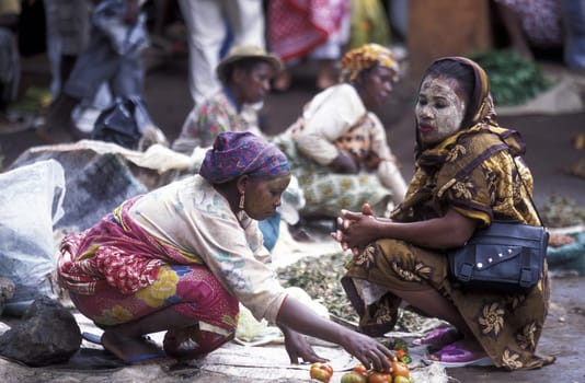 Women at the Market in the city of Moutsamudu on the Island of Anjouan on the Comoros Ilands in the Indian Ocean in Africa.
