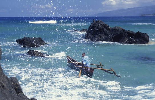 the beach of the village Moya on the Island of Anjouan on the Comoros Ilands in the Indian Ocean in Africa.