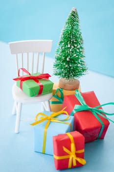 Colorful gifts and Christmas tree for Christmas