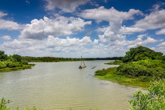 Landscape with Thai fishing boat,traditional bamboo boat