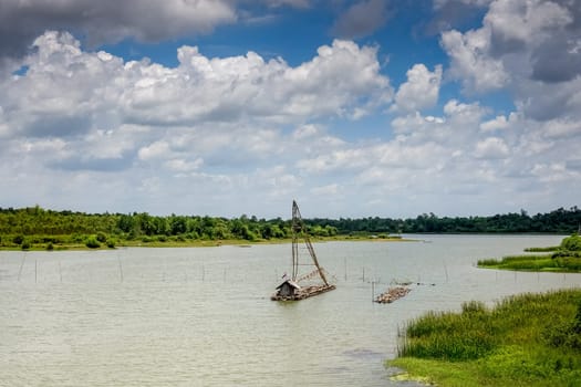 Landscape with Thai fishing boat,traditional bamboo boat