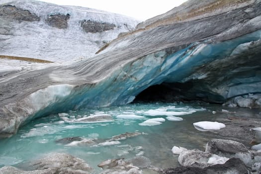 Glacier Cave - A cave with blue ice in the glacier in Sölden