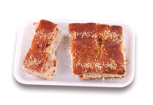 Pastry puffed with pork cracklings on white background.