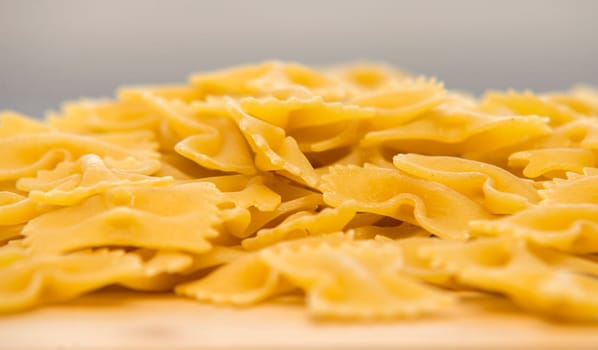 Closeup of uncooked italian pasta - farfalle