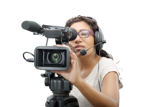 a young African American women with professional video camera and headphone on white