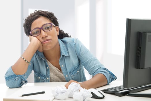 an American African business woman tired in his office