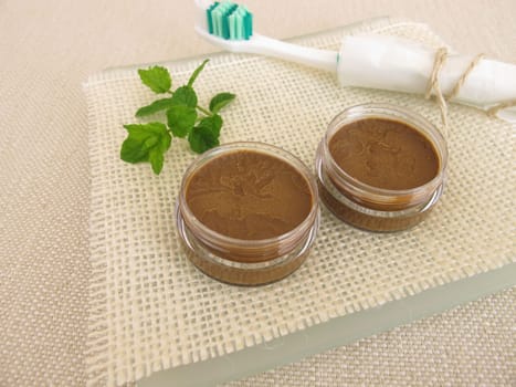 Homemade toothpaste from coconut oil,healing earth powder and peppermint oil
