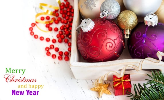 Wooden tray with colorful Christmas decorations border