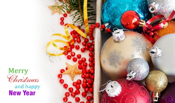 Wooden box with colorful Christmas decorations border