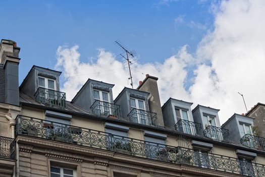 windows of Parisian mansard rooms