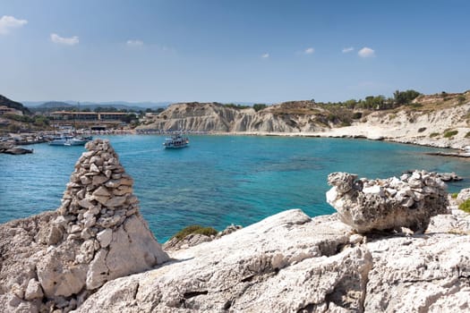 Kolymbia beach with the rocky coast in Greece.