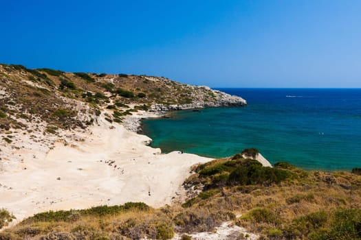 Kolymbia beach with the rocky coast in Greece.