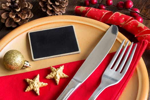 Festive table setting with small chalkboard close up