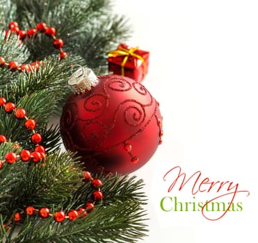 Festive decoration with red bauble and garland