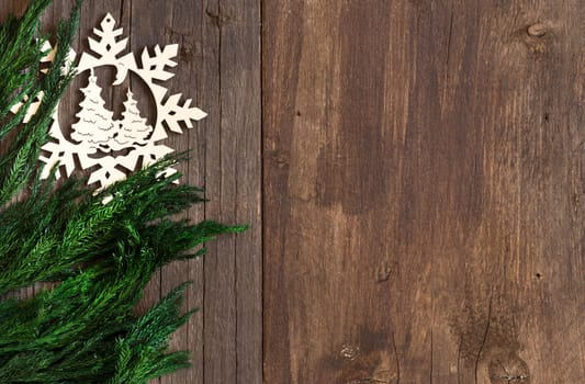 Christmas border design with snowflake on wood