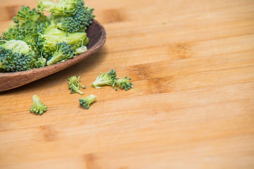  fresh broccoli solated on a wooden background